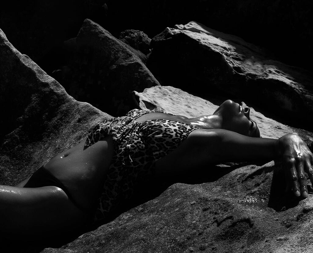 black and white photo woman reclining